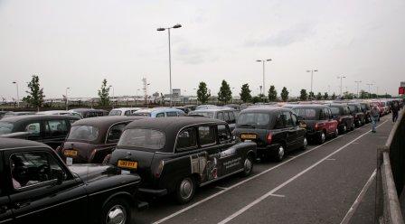 Black cabs at Heathrow photo Rex